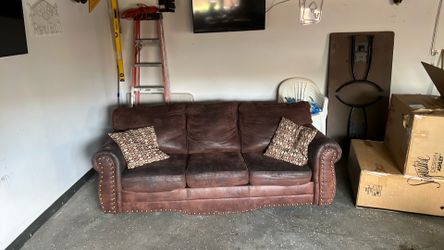 Brown sofa/ couch