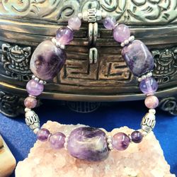 Bracelet with unique square cut centerpiece amethyst.
