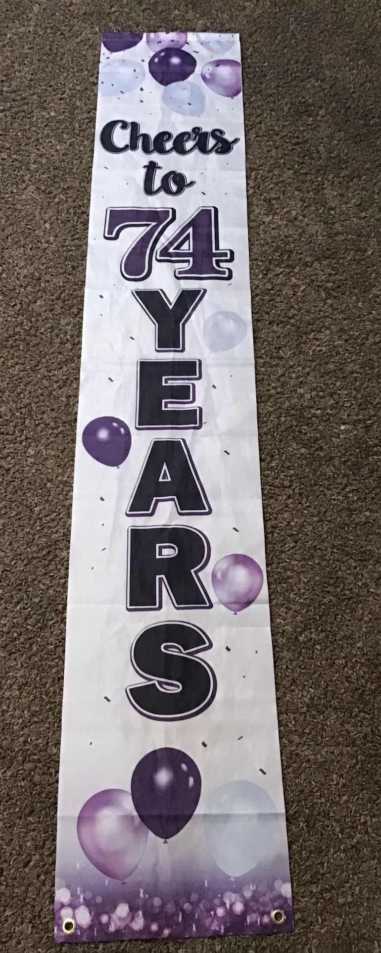 “Cheers To 74 Years” Banner