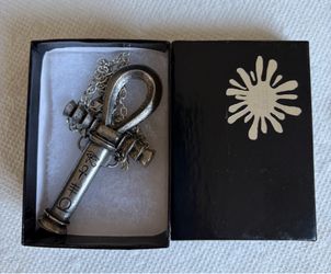 Ankh necklace with hidden dagger