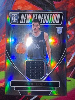 Rookie Zach Edey patch and Optic rookie Yukon Kawamura /225 orange