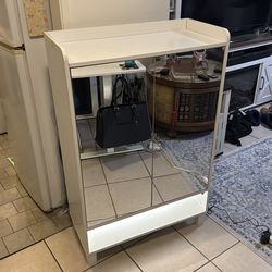 White Cabinet with Mirror Doors and Lighted shelf