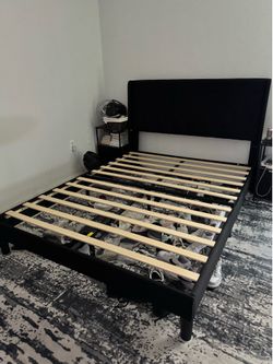 Black Queen size fabric bed frame with headboard