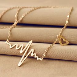 Beautiful Necklace With Heart Charm And Electrocardiogran