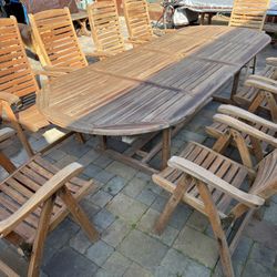 Oval Teak Table 118” And 10 Folding Teak Chairs