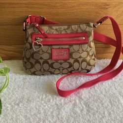 COACH Crossbody bag with heart shaped zipper (MARKED DOWN FROM $90)