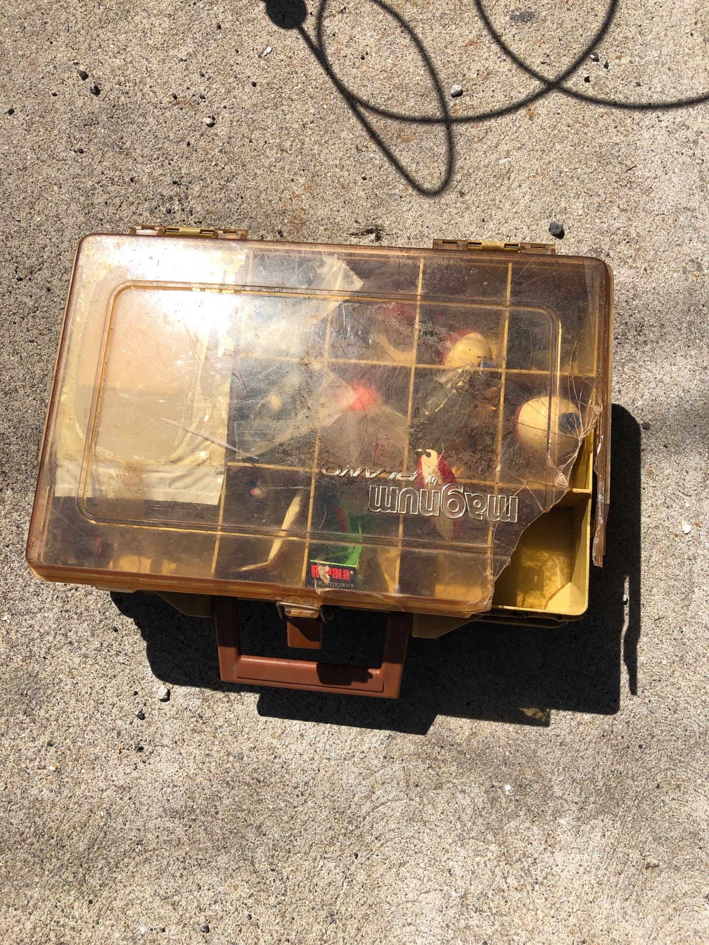 Vintage Plano tackle box with fishing lures