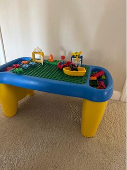 130 legos pieces with a table