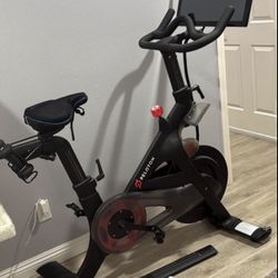 Peloton Bike And Shoes 