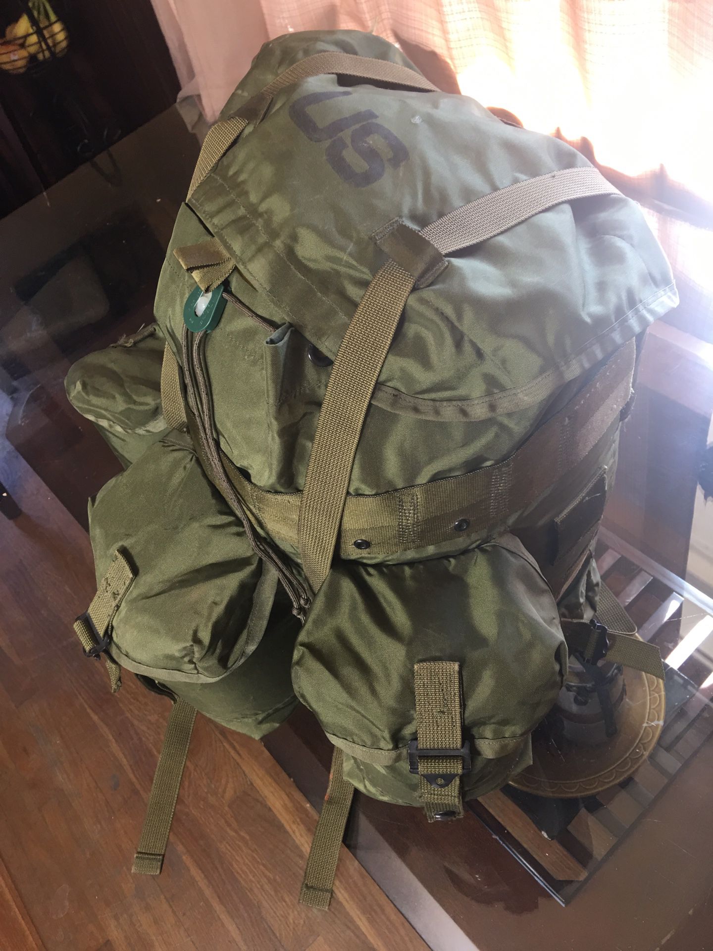 US military backpack and belt plus a canteen