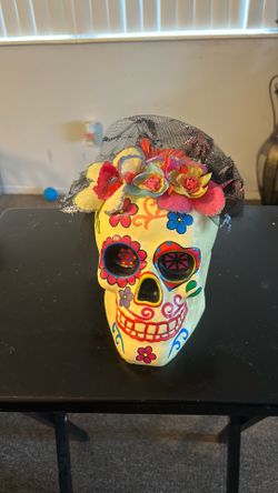 This item is a decorative Calavera Catrina (Sugar Skull) figurine, widely used for Día de los Muertos (Day of the Dead)