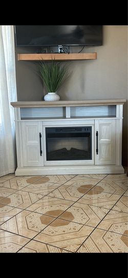 54 inch tv stand / fireplace/ capnets