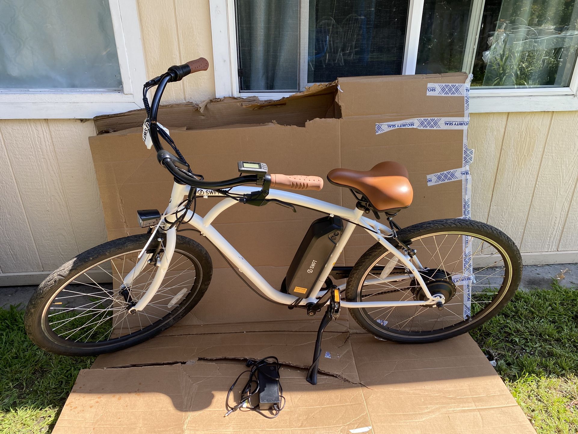 SWFT - FLEET eBike w/ 37.2mi Max Operating Range & 19.8 mph Max Speed - White. It comes with original power supply Charger. LOW MILEAGE Fully Working