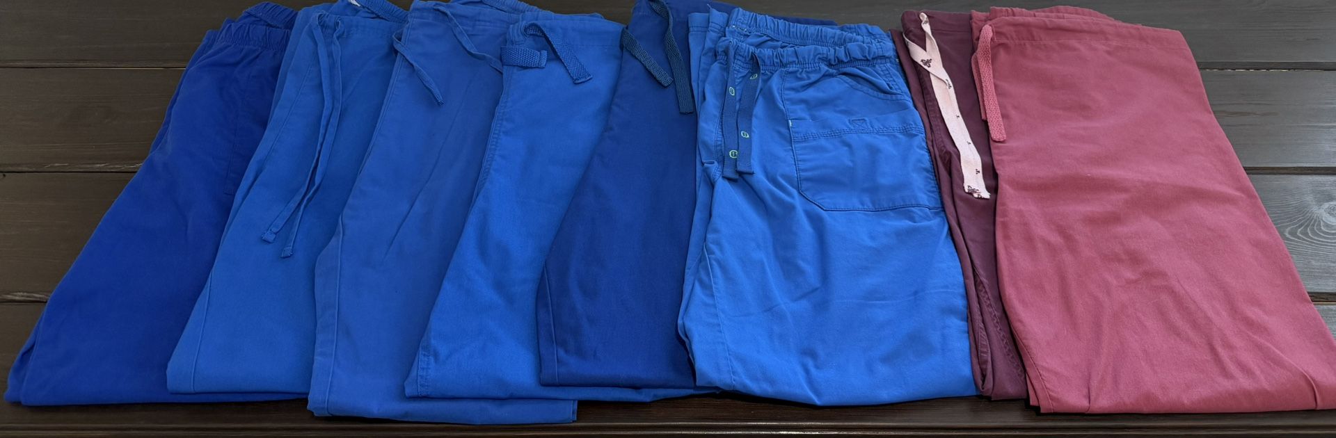 Womens scrub uniforms 8 piece lot of bottoms size medium/large (have a lot for tops as well)