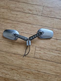 Motorcycle turn signal rear view mirror