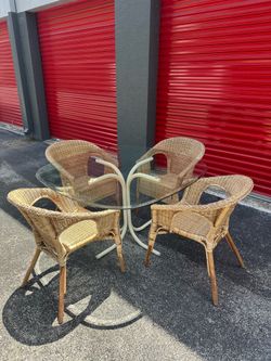 Ikea dining table and chairs / rattan / bamboo/ wicker / in good condition