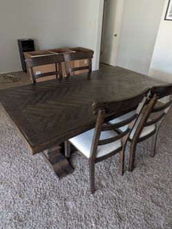 Dark Wood Table with Extender for 6-8 seats and comes with 4 chairs