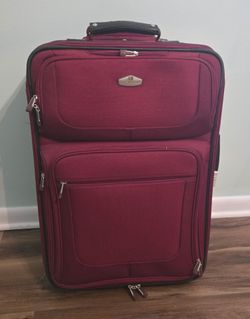 Ricardo burgundy travel suitcase
