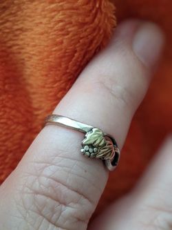 silver ring with  10k gold size 7