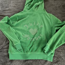 This item is a vibrant green Juicy Couture Kids zip-up velour hoodie featuring a rhinestone logo on the chest.