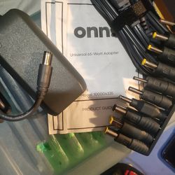 O N N Universal 65 Watt Adapter Model 100004335 10 Piece In One Adapter