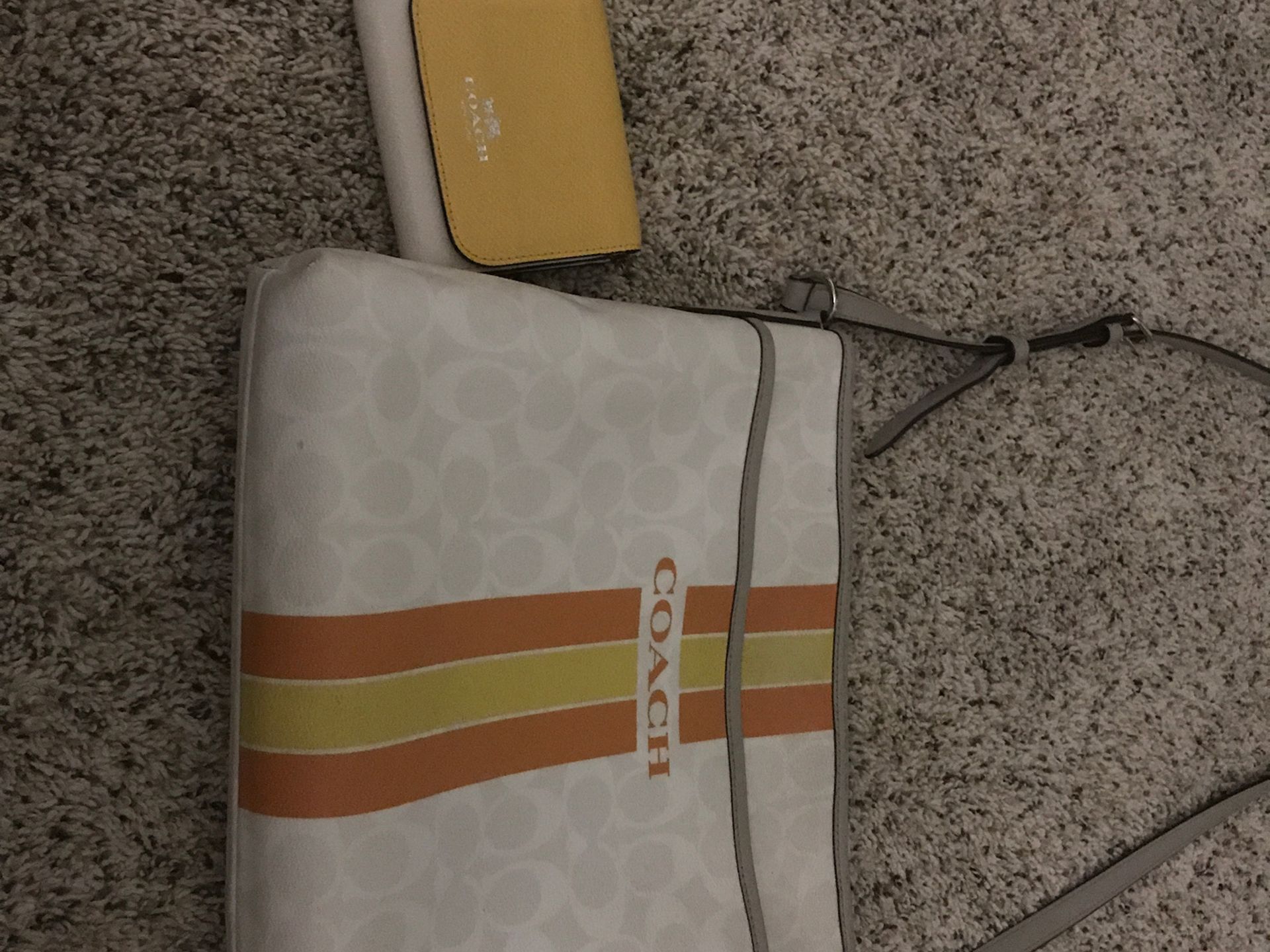 Coach purse with matching wallet .