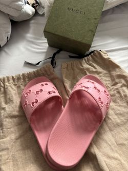 woman pink gucci slides