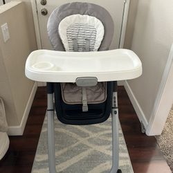 Graco - Gray and White High Chair