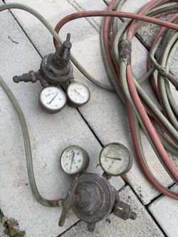 torch with Regulators And attached hoses