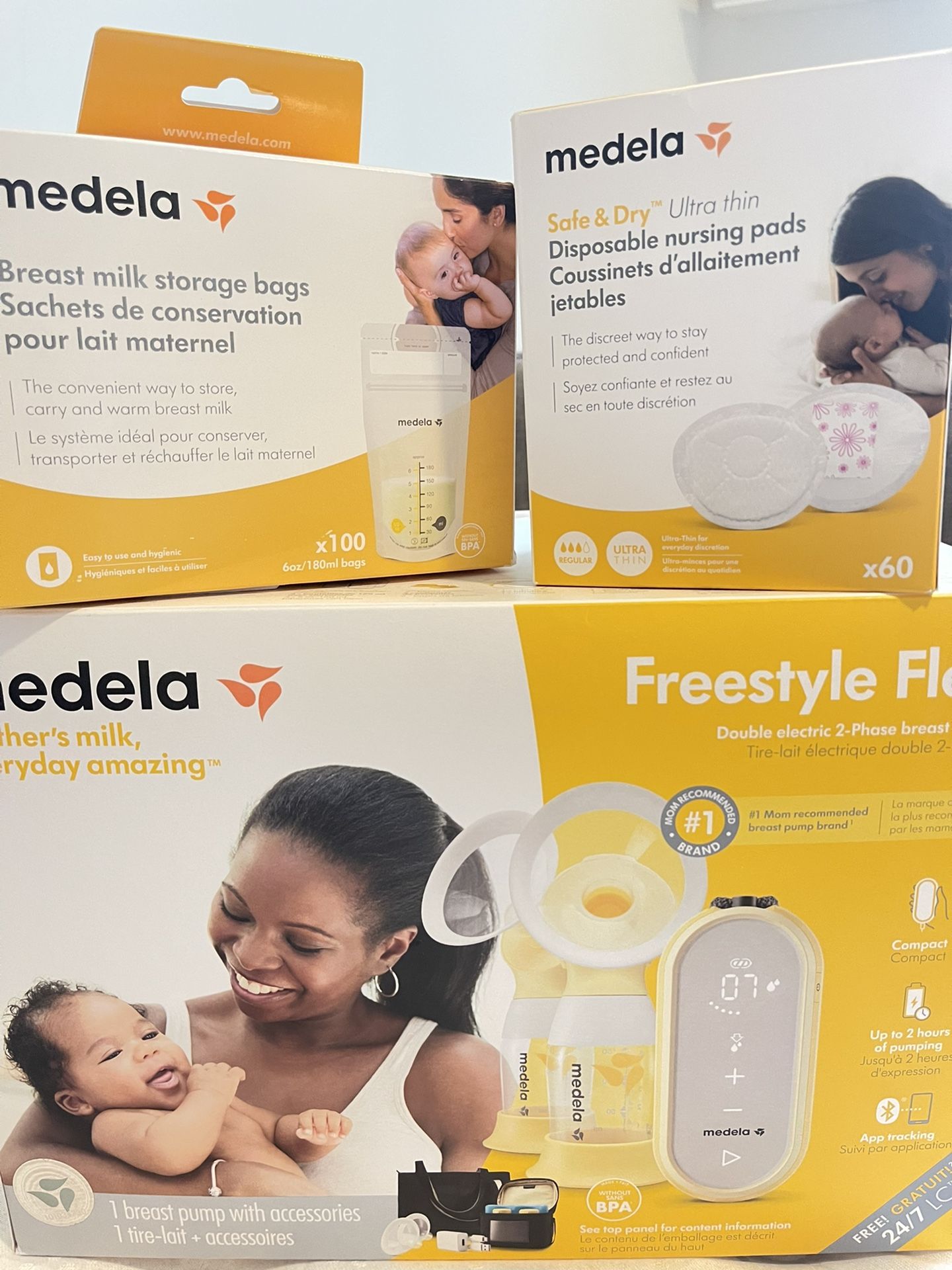 Medela Freestyle Flex Breast Pump, Closed System Quiet Handheld Portable Double Electric Breastpump, Mobile Connected Smart Pump with Touch Screen LED