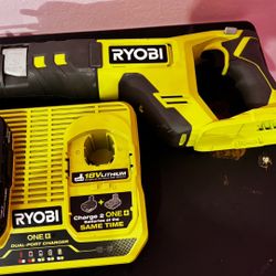 Ryobi saw with battery and two port charger like new