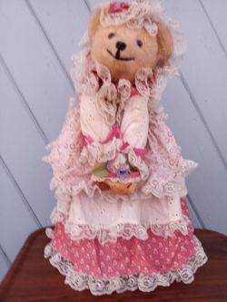 Vintage hand made tall heavy ( on the sand cone) bear. Beautiful.
