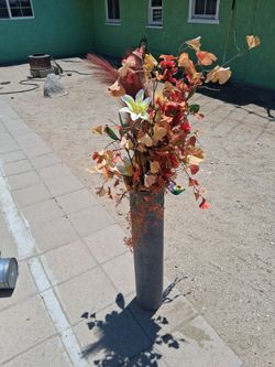 Fake Flowers in a vase to stand about five feet half paw