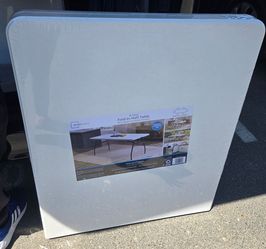Mainstays White 6 Foot Fold-in-Half Plastic Table, Indoor Outdoor, Scratch Resistant, Stain & UV Damage, Built-in Carry Handle