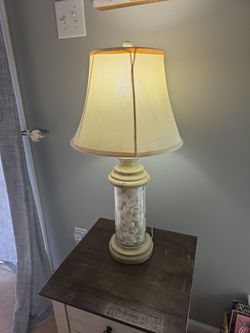 It's a lamp with seashells on the inside
