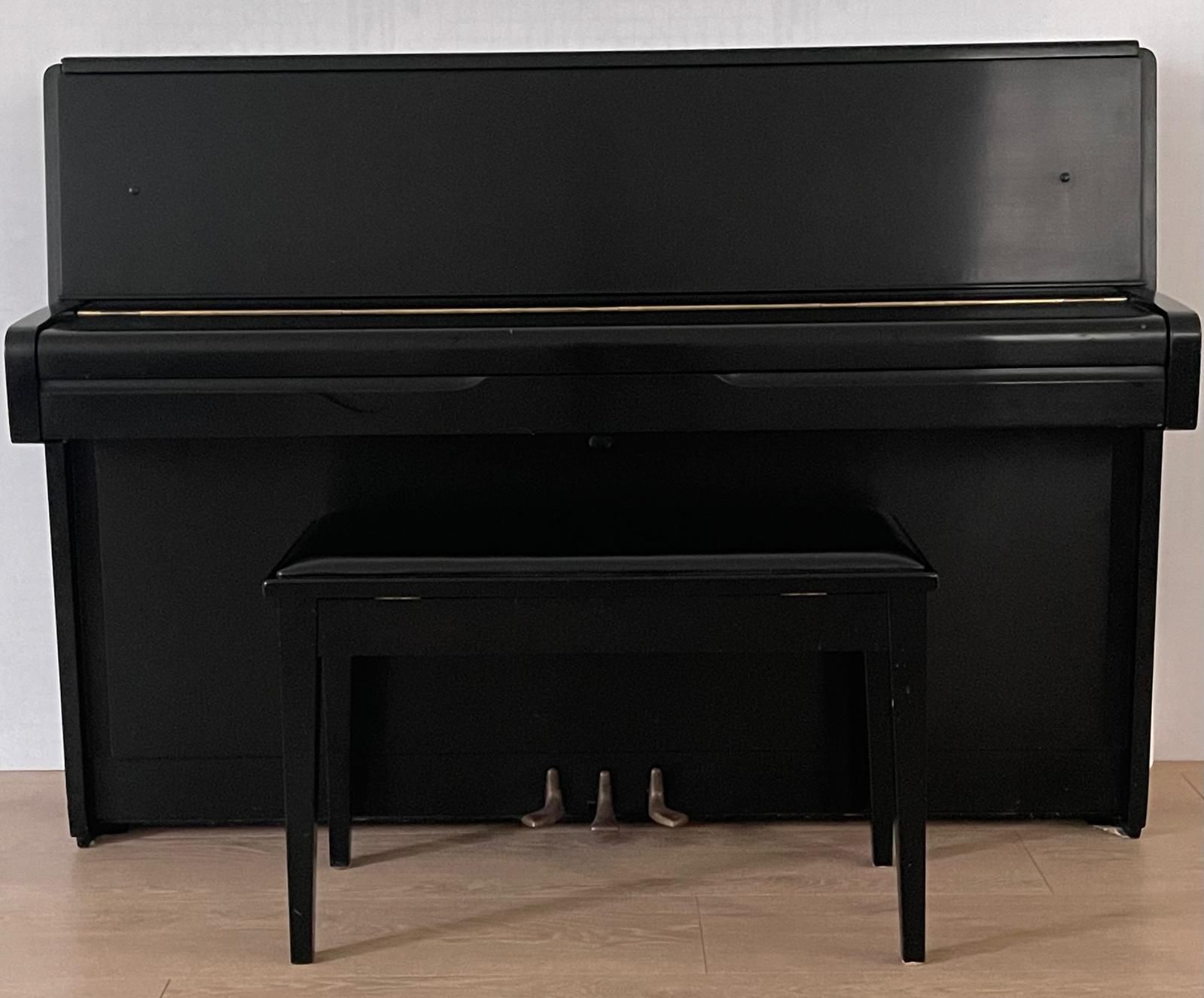 Yamaha upright piano with seat