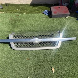 Grill cat eye.  Para Silverado 2003