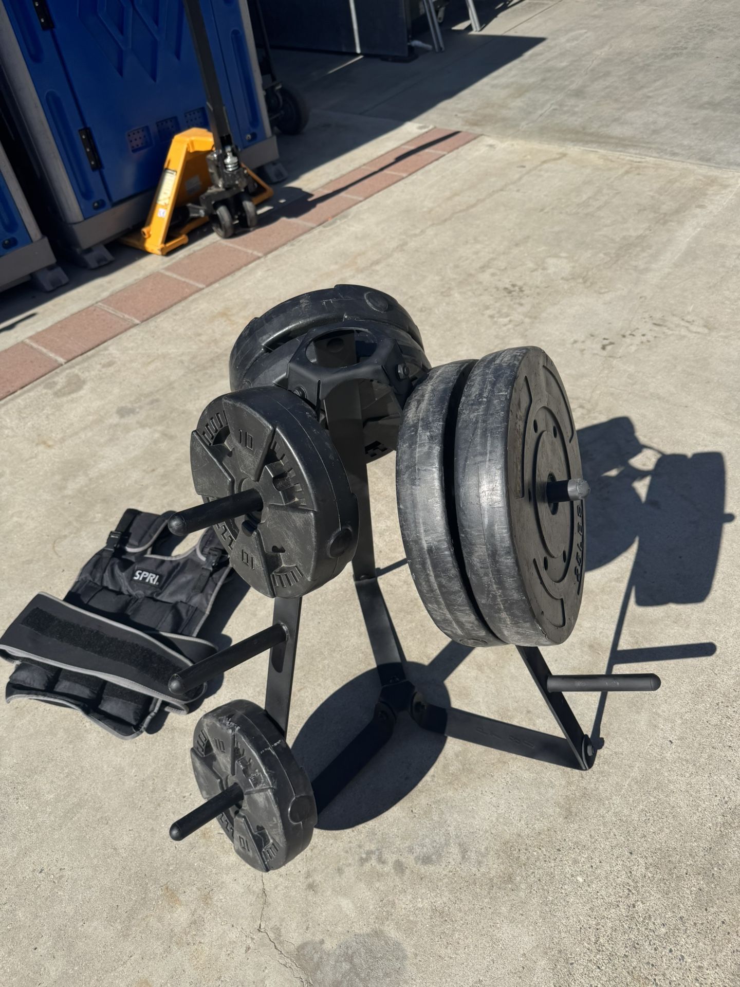 100 Pound Weight Plates/rack/20 Pound weight Vest