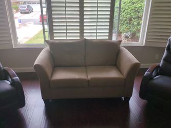 Tan Love seat sofa