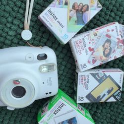 Fujifilm Instax Mini 11 (white) + 50 total shots of film (specialty packs: Mermaid Tail, Matte Black, Heart, and classic white)
