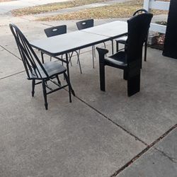 Black Folding Table And Five Chairs 