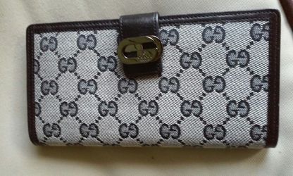 AUTHENTIC GUCCI WALLET IN NEW LIKE CONDITION
