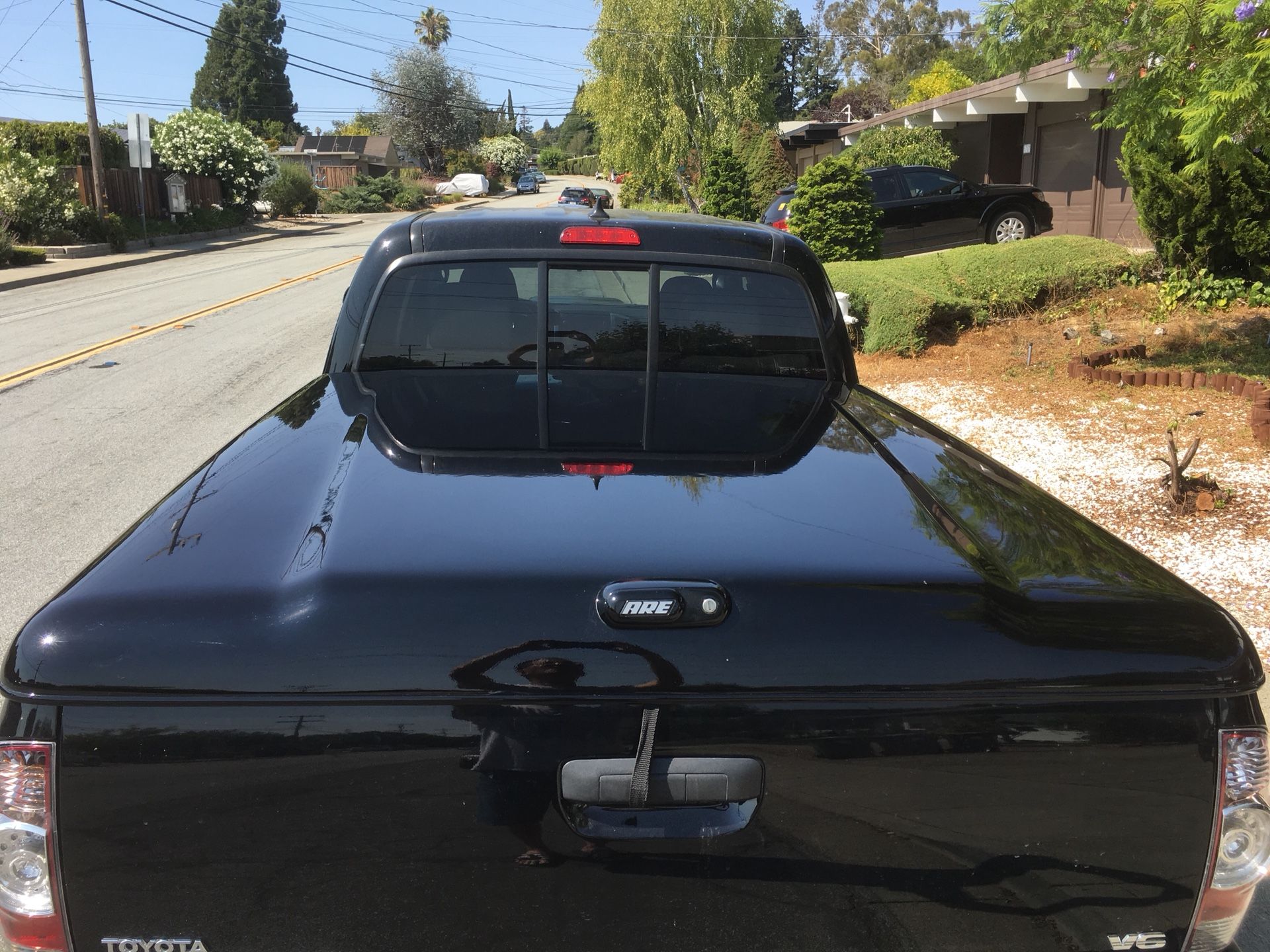 A.R.E. LSII Fiberglass Tonneau Cover with lock for Toyota long bed for Sale in Castro