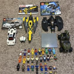 Four Lego Sets With 23 Mini Figures 