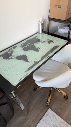 The World Glass Office Table and Ivory Swivel Chair with Gold Legs