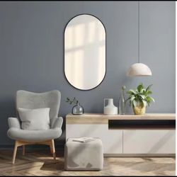 Glacier Bay 18 in. W x 30 in. H Oval Shape Aluminum Framed Wall Mirror in Black