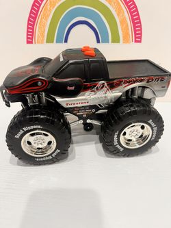 MONSTER TRUCK WITH 3 SOUND BUTTONS - DOES WHEELIES