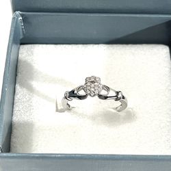 Brand New 16 Authentic Diamonds Set In A Silver Wedding Ring. Size 7. I will bring a diamond tester