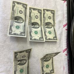 5 two Dollar Bills