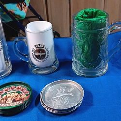 Vintage glass beer mugs and coasters